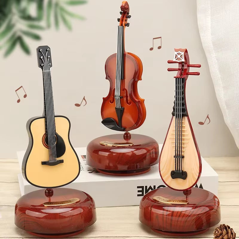 "Rotating Guitar & Violin Music Box – Creative Gift for Birthdays & Holidays"