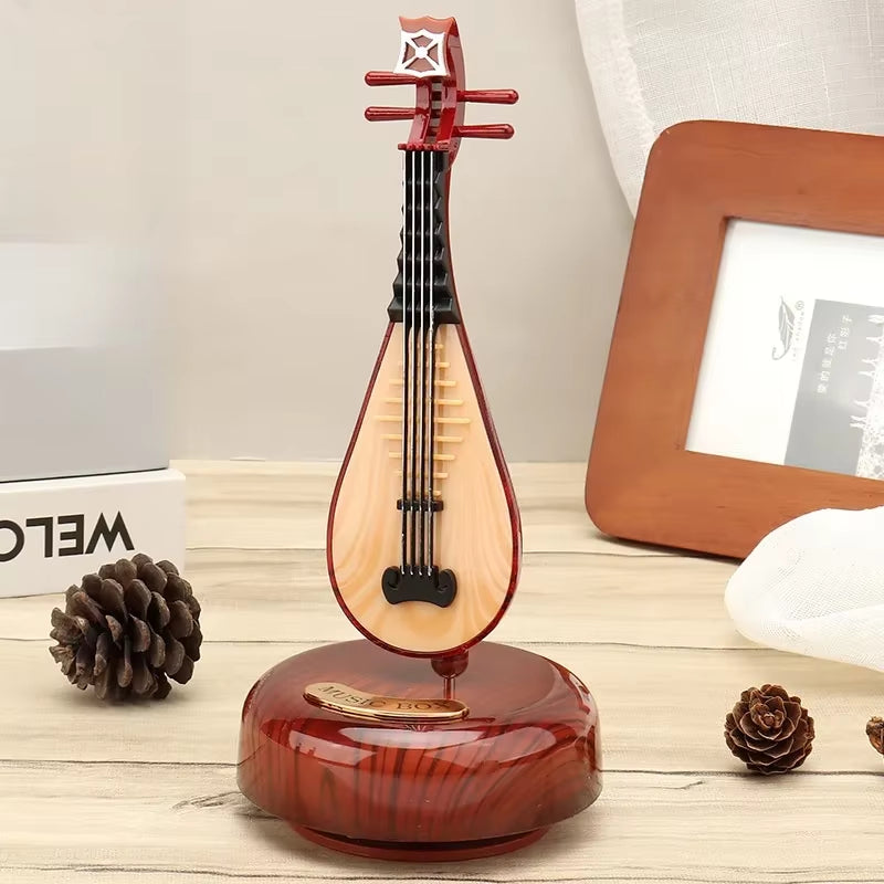 "Rotating Guitar & Violin Music Box – Creative Gift for Birthdays & Holidays"